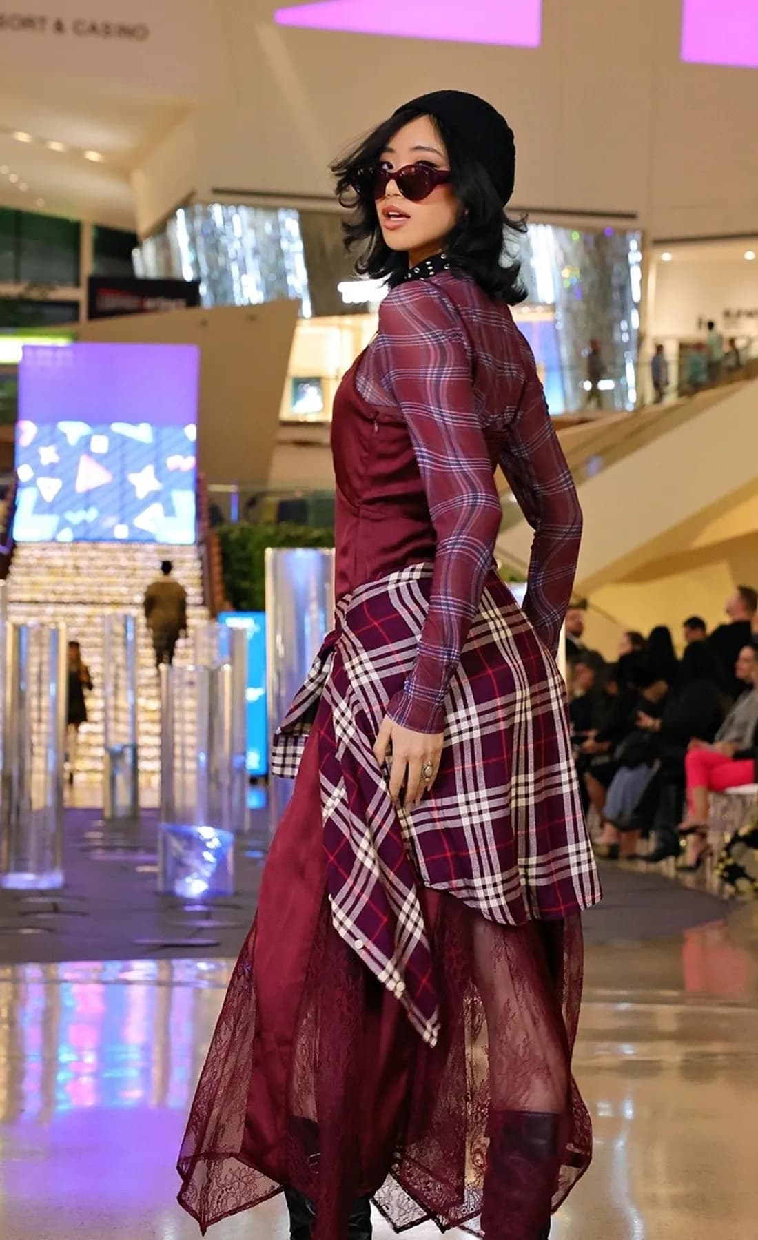 Runway model in plaid at a Vegas Fashion Week show